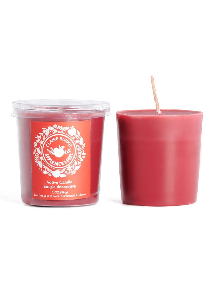 Claire Burke Applejack and Peel scented votive candle embodies the epitome of home. Experience notes ofof baked apples, cinnamon, spice and a twist of citrus.