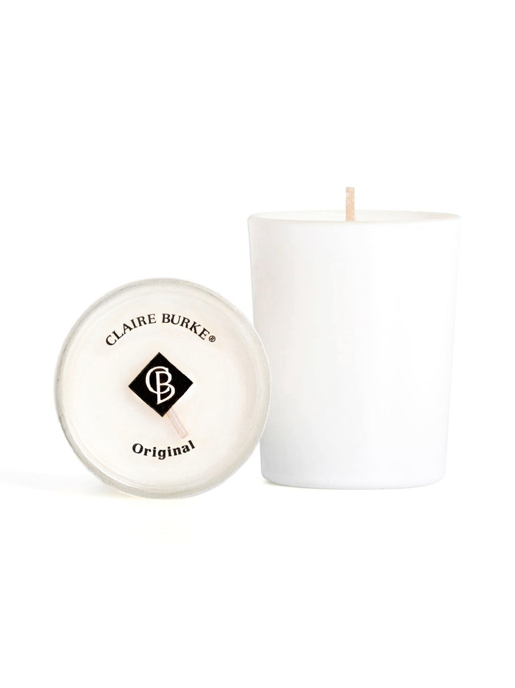 Claire Burke Original Votive candle is the perfect touch of fragrance. Enjoy a timeless blend of rose, lavender, patchouli, vetiver and spices. There is no name better than Claire Burke Original.