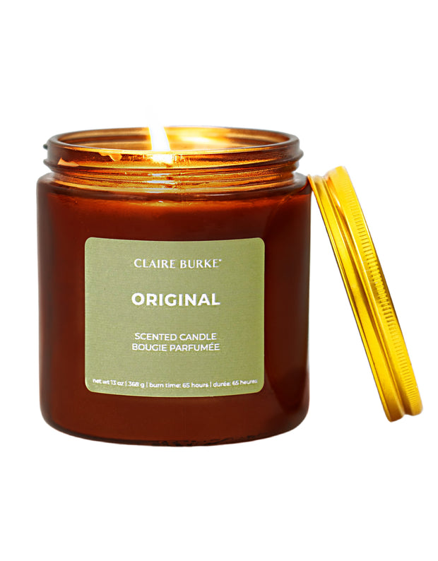 Original Claire Burke Candle formulated with a custom coconut-soy wax blend, hand-poured into glass amber vessel. Floral and fragrant embodies notes of lavender, rose, vetiver, and patchouli for a spicy, floral bouquet. 