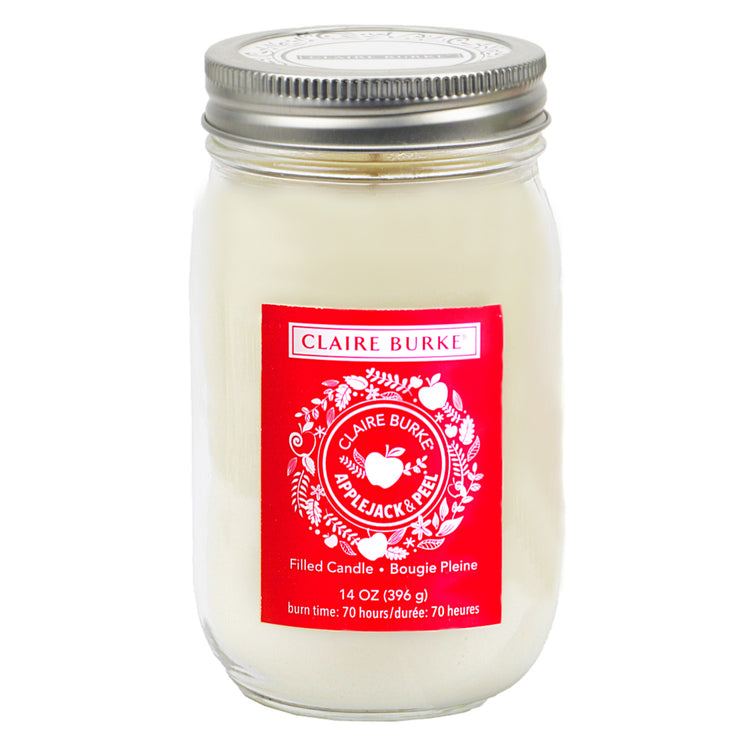 A modern celebration of vintage charm. Magically luminous in a newly designed glass. The radiant glow and welcoming scent of baked apples, cinnamon, spice and a twist of citrus reminds you of home-baked goodness warmed with a hug from mom.